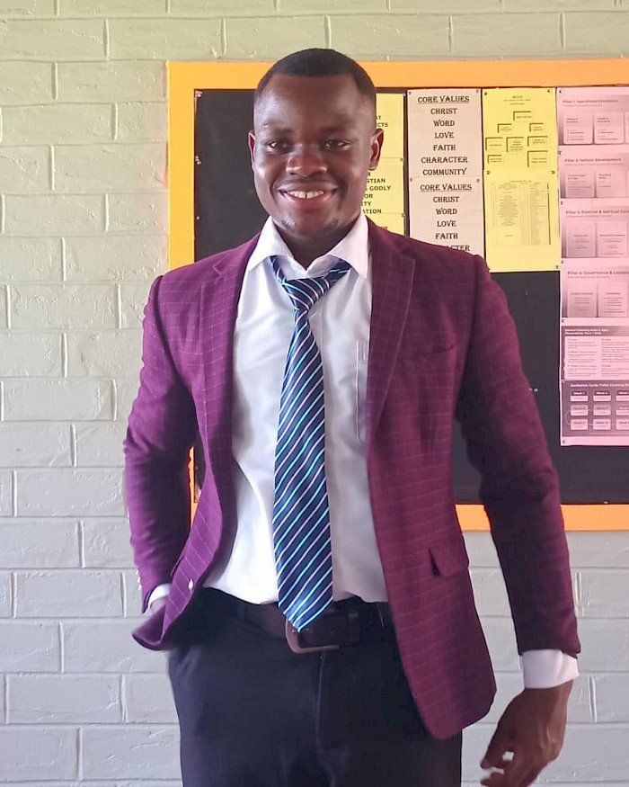 Abuzeku Fred Cyrus, Schools Director